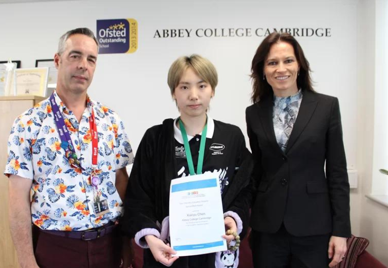 Max Receives Her Canadian Chemistry Contest Award From Dr Elena Hesse