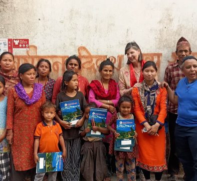 Students at staff at Bal Monorama Lower Secondary School, Nepal