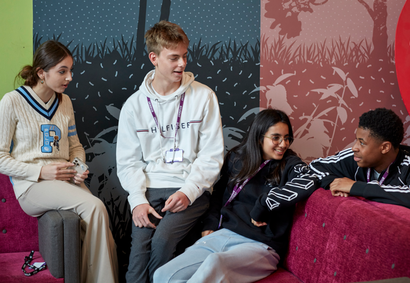 Students Relaxing In College Common Room