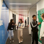 Students In DLD College London Coridoor