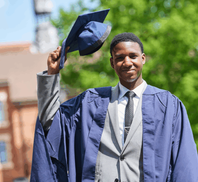Male Student Celebrating Graduation At Abbey College Cambridge