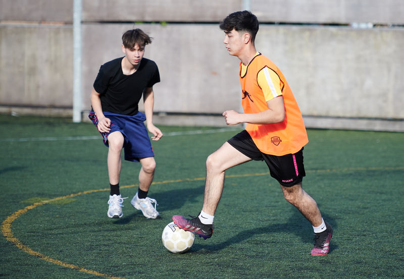 Chinese Students Playing Football