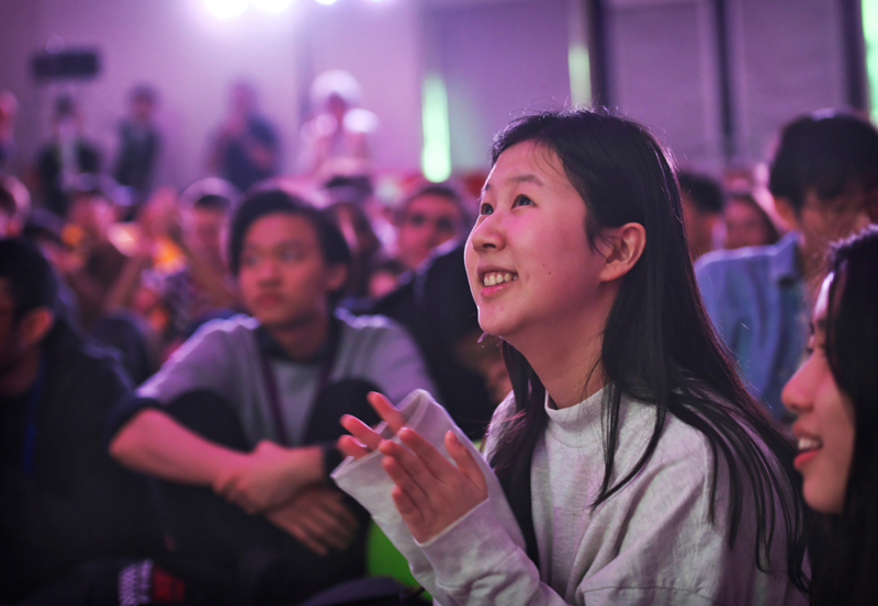 Female Chinese Student Enjoying The School Concert