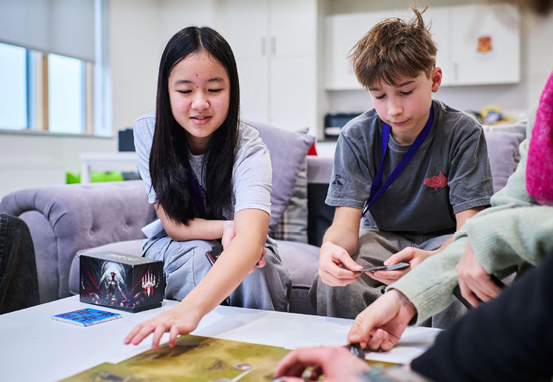 Students Playing Games In The Common Room