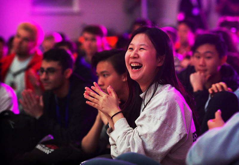 Female Student Enjoying Music Concert At Abbey College Cambridge